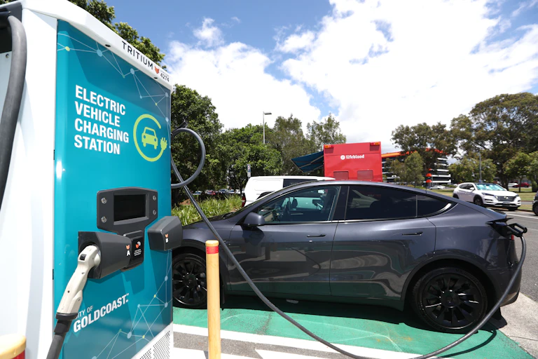 Electric vehicle at a charging station