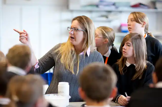 A teacher explaining a concept to students.