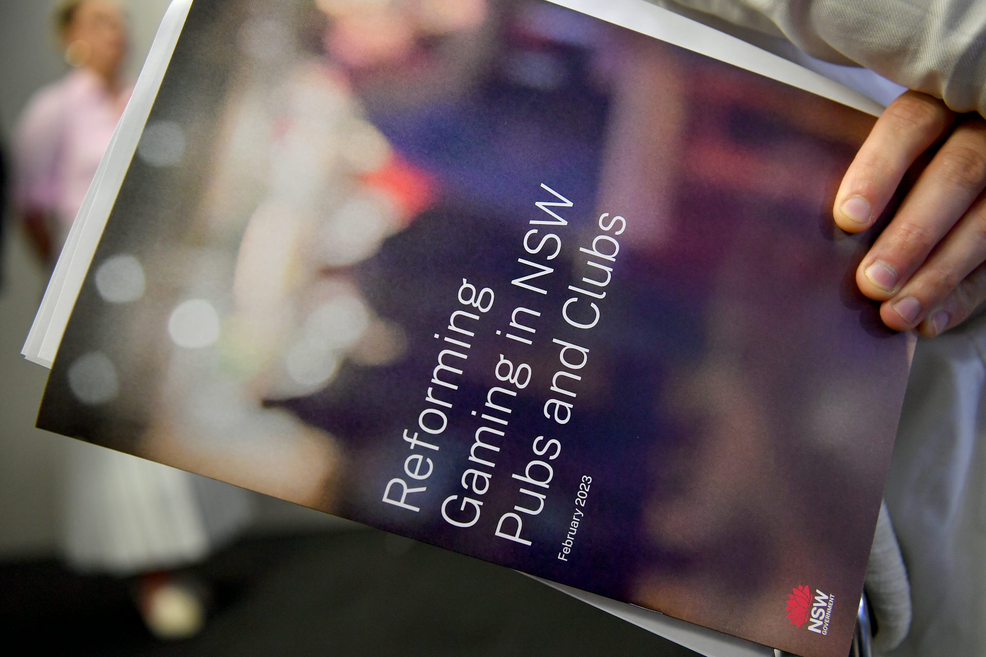 The focus of the NSW government's proposed mandatory cashless gaming system for pubs and clubs is to minimise money-laundering risks. But it could also help problem gamblers.