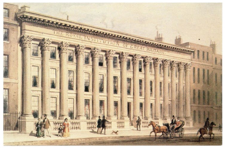 a painting of the Royal Institution building in London with horse and carriages outside.