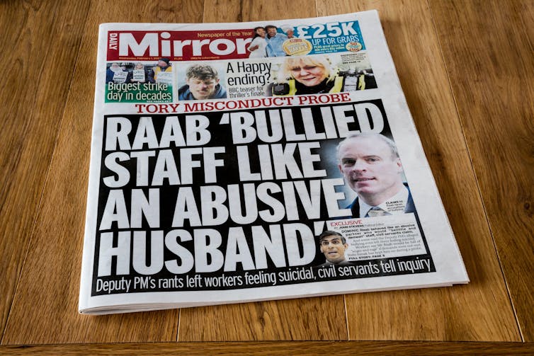 A copy of The Mirror newspaper with a front page that reads 'Raab bullied staff like an abusive husband'.