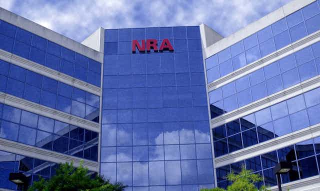 Big glass office building with the letters NRA up top