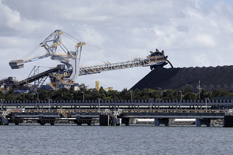 Preparing to export coal from the Port of Newcastle. Image looks over the water to the Kooragang coal loader