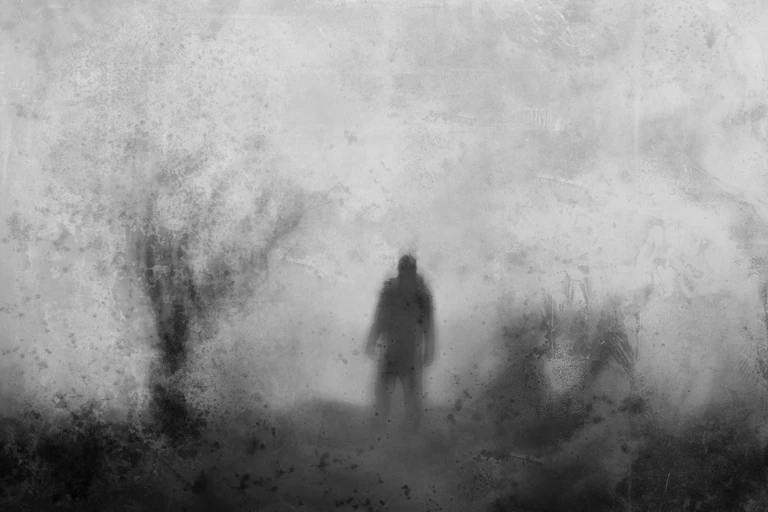 Shadowy figure in a black and white background