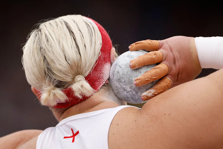 Back of Amelia Strickler before taking a shot putter