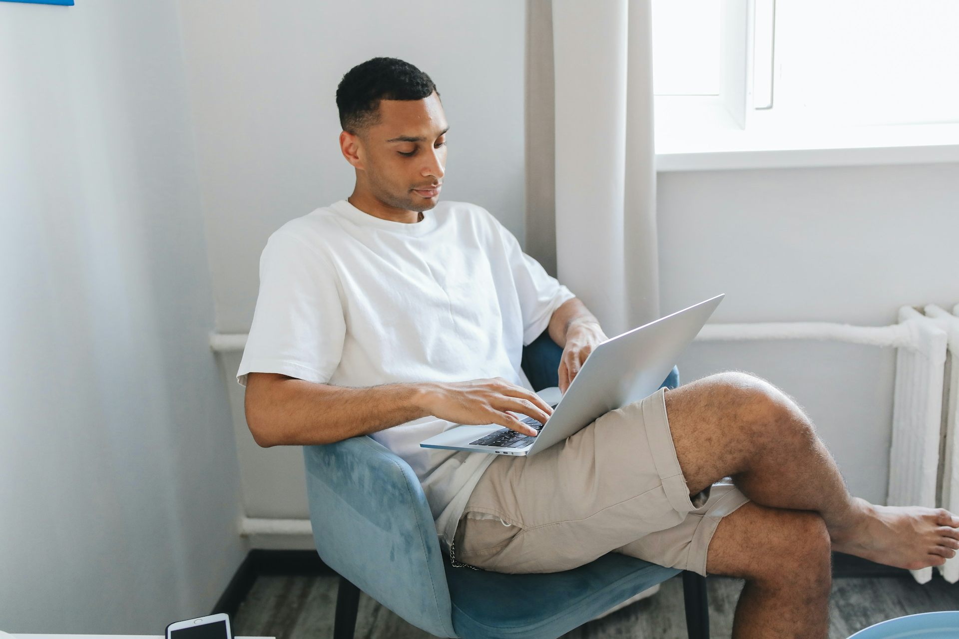 Chair with crossed online legs