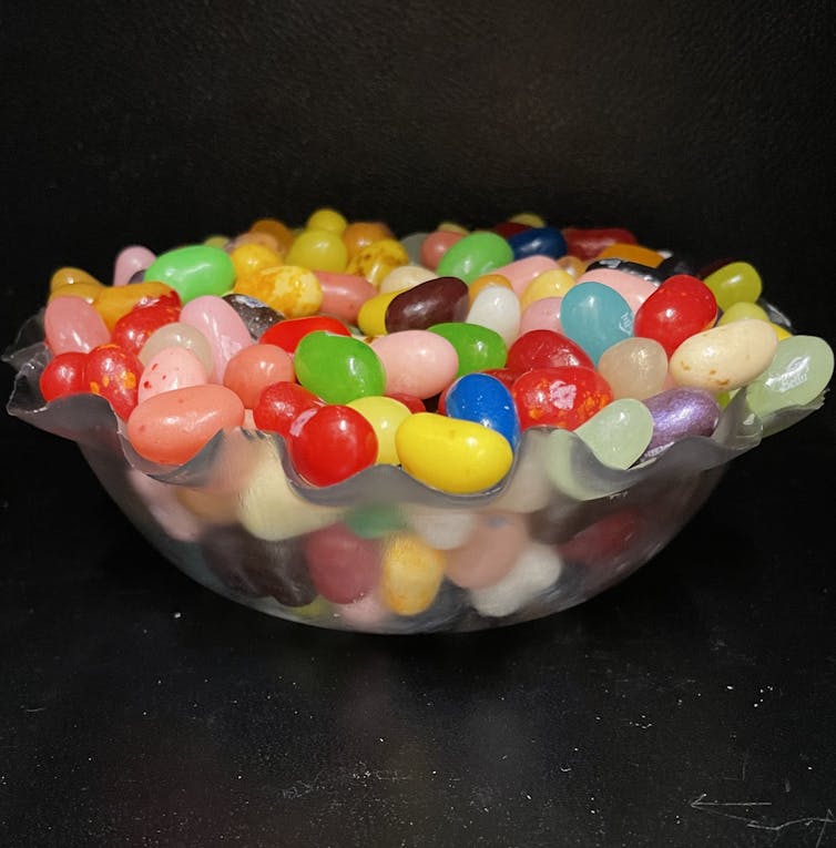 A wavy bowl holding jelly beans.