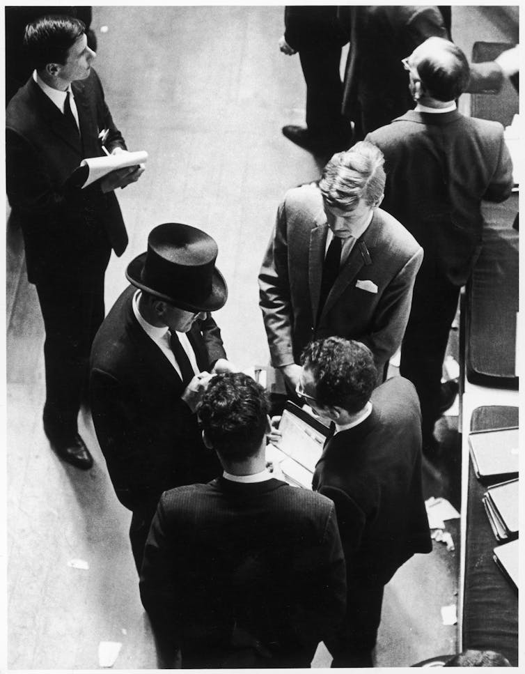 An overhead shot of men in suits.