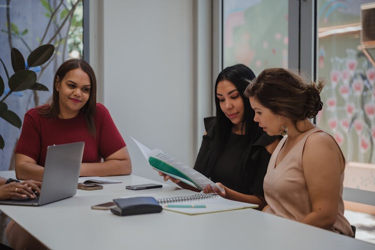Three women at a table