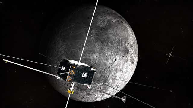a spacecraft — looks like a cube with sensors emerging — orbiting the moon