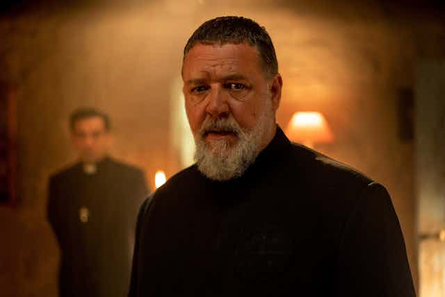 Russell Crowe as a priest