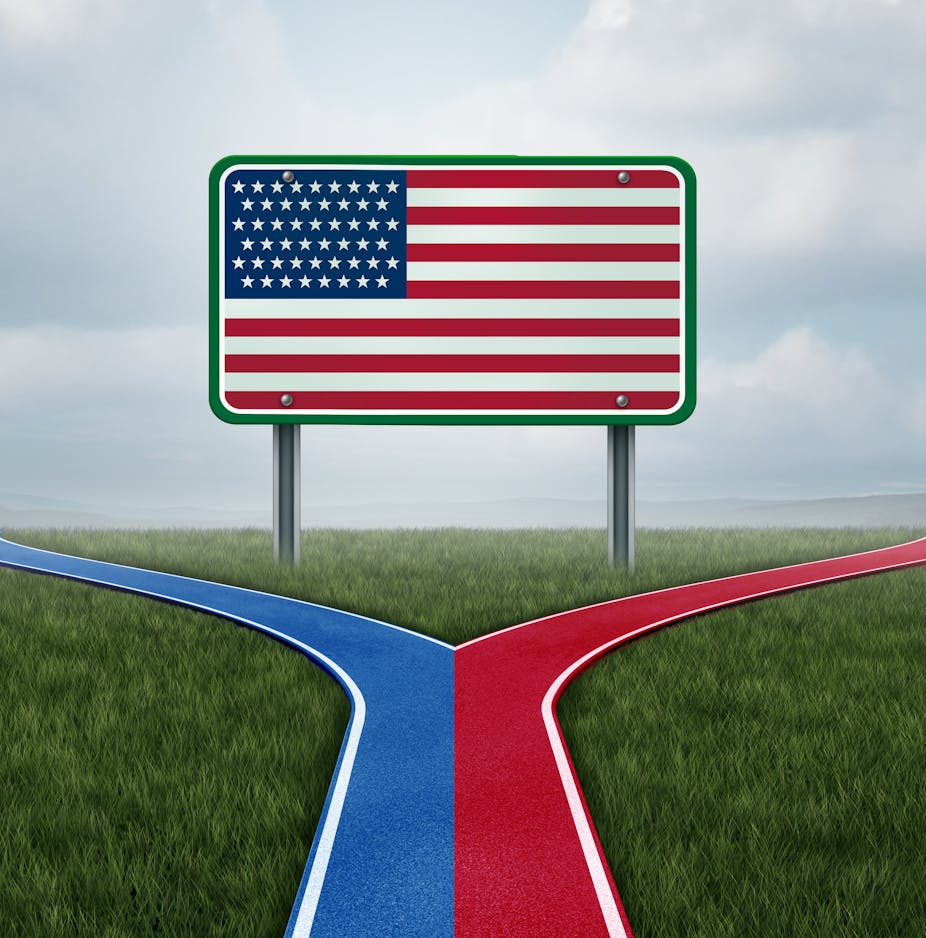 An American flag is seen in an image as a red and blue path heading towards it diverge in different directions 