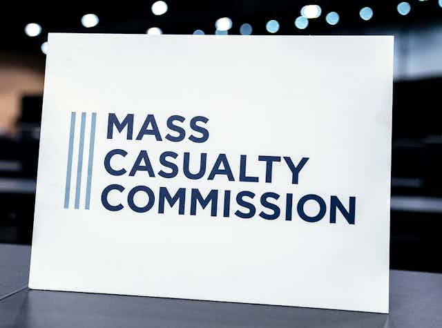A placard with the words: Mass casualty commission