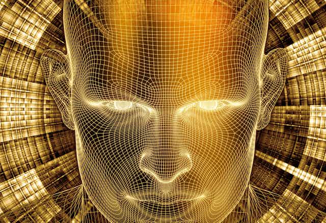 Wireframe image of a human face in gold and white hues on a futuristic background