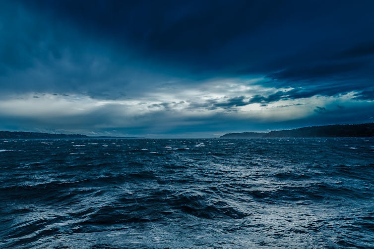 turbulent ocean under stormy sky