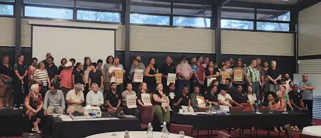 People holding a meeting to support the Voice