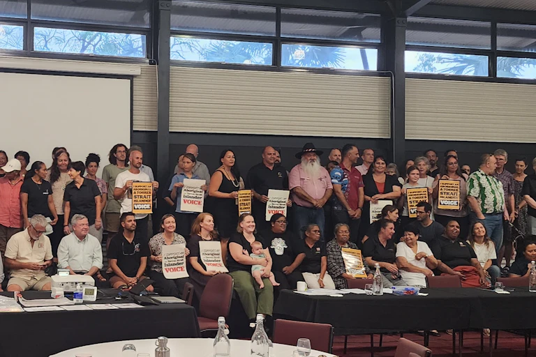 People holding a meeting to support the Voice