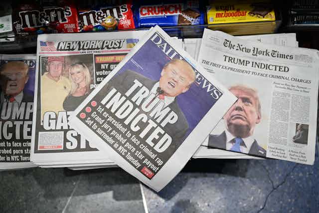 Several headlines on newspapers about the indictment of Donald Trump.