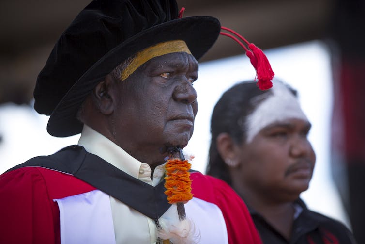 Yunupiŋu in PhD regalia.