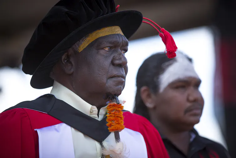 Yunupiŋu in PhD regalia.