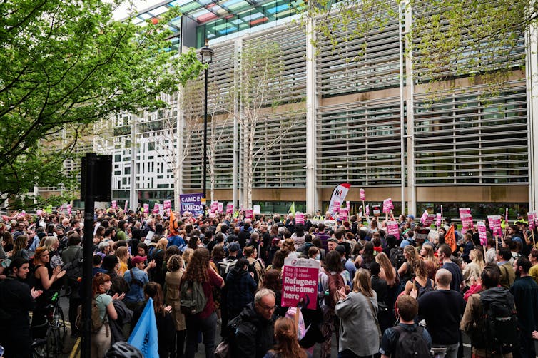 Crowd of protesters outside the Home Office in London
