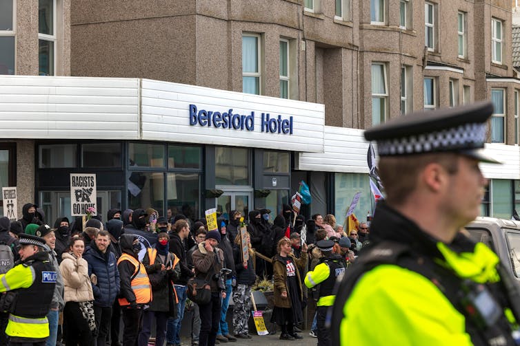 Protesters outside a hotel