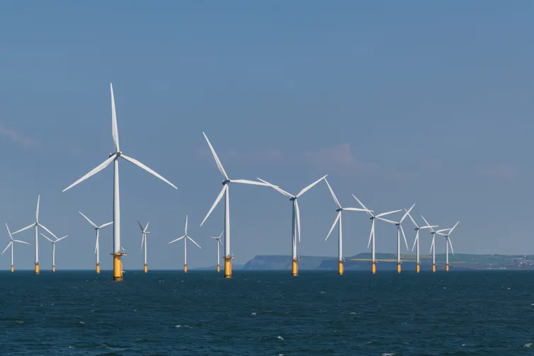 A wind farm off the coast of the UK in the North sea.