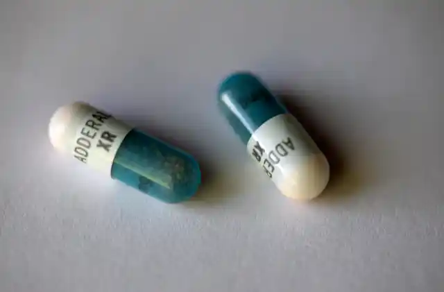 Two Adderall XR capsules displayed on a white background.