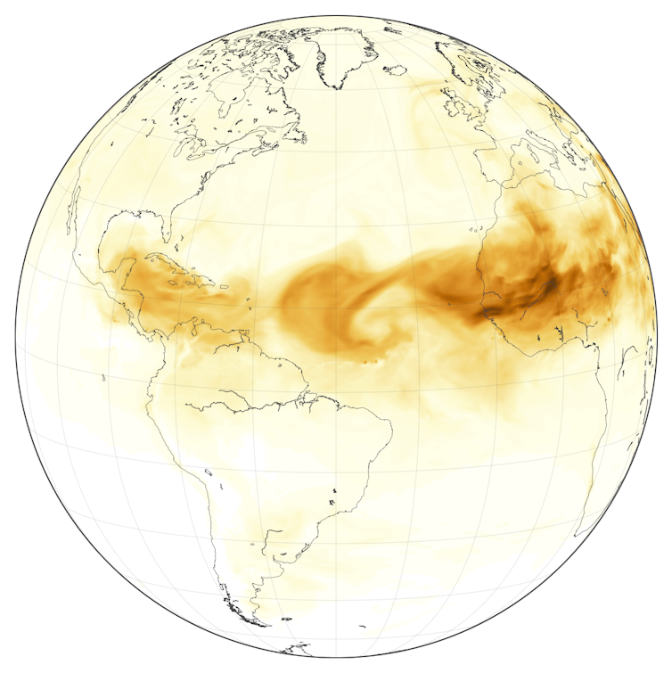 Map of the globe with brown plumes blowing west from northern Africa.
