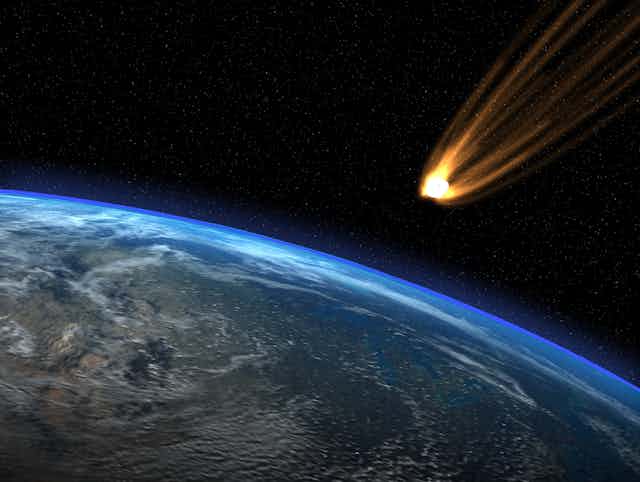 An illustration showing a meteor approaching Earth