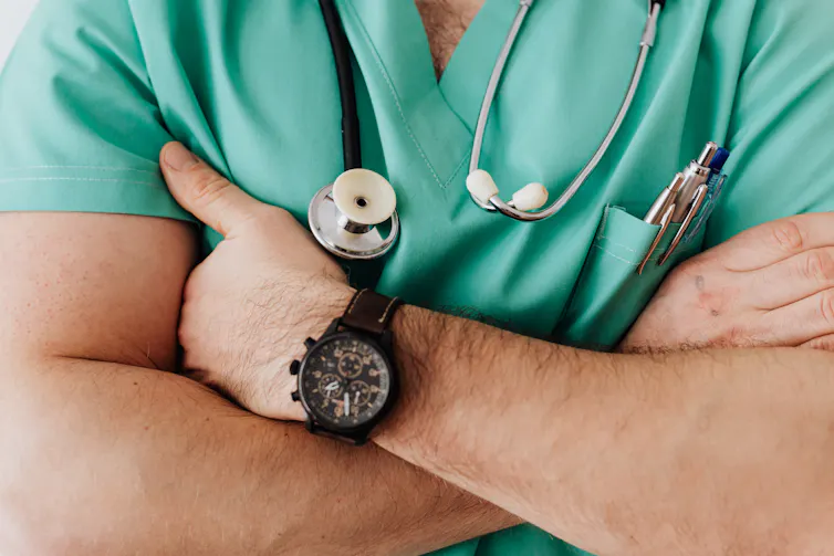 Doctors' arms crossed