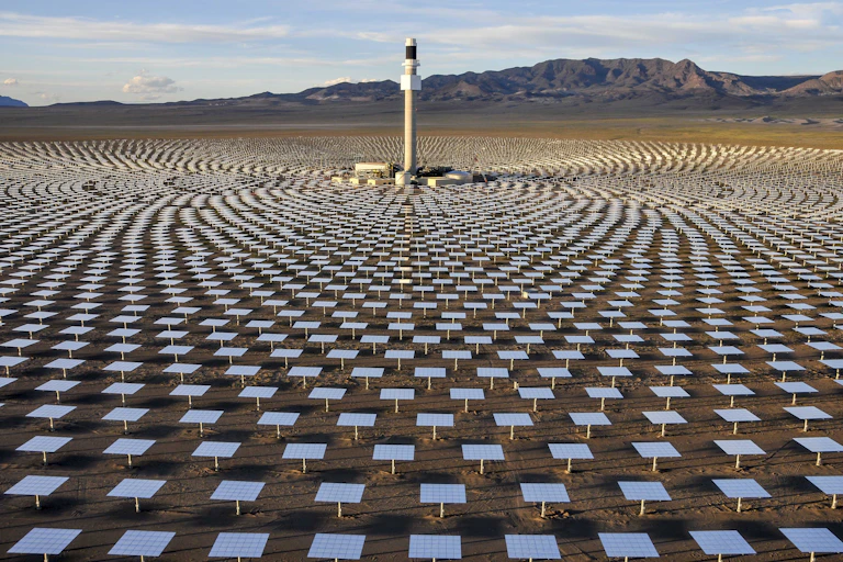 A field of mirrors concentrates light and heat on a central tower at the Crescent Dunes Solar Energy Project near Tonopah, northwest of Las Vegas.