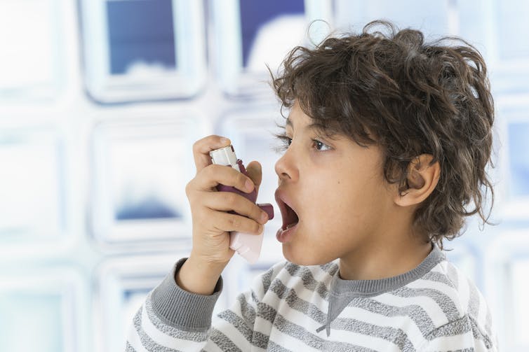 Child uses enhaler