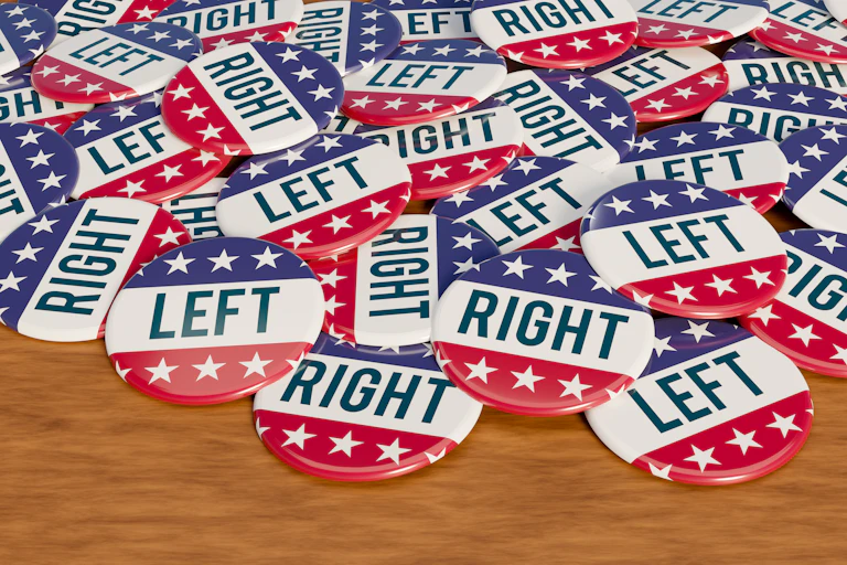 A pile of red, white and blue campaign buttons that say either 'RIGHT' or 'LEFT.'