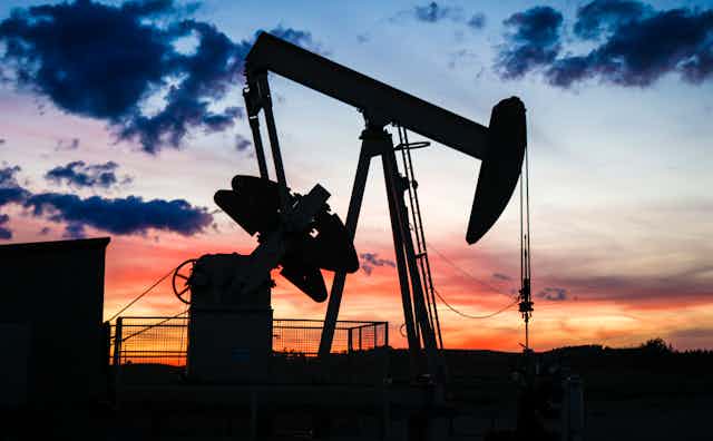 A pumpjack draws out oil from a well head near Calgary, Alta.