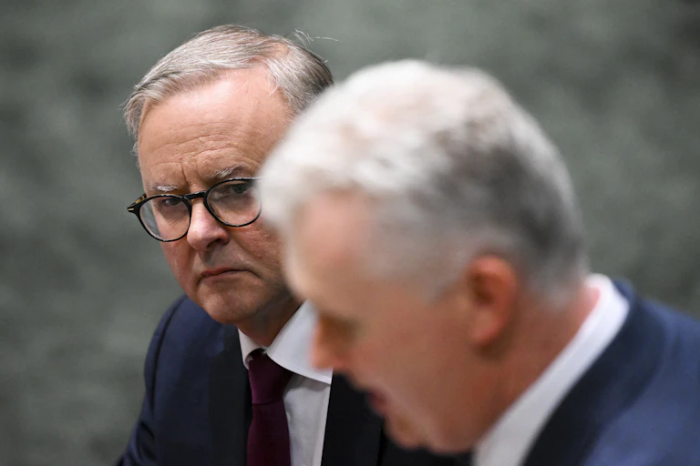 Australian Prime Minister Anthony Albanese listens to Australian Employment Minister Tony Burke during House of Representatives Question Time at Parliament House in Canberra, Monday, November 7, 2022.