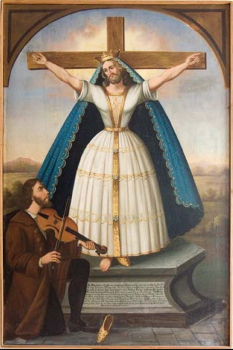 A woman with a beard wearing a dress being crucified on a cross.
