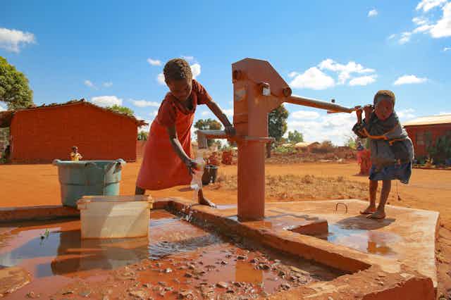 Children using water well