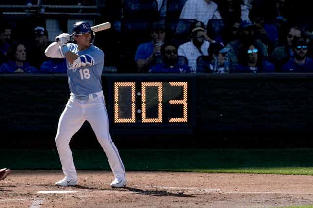 A hitter with the Kansas City Royals is at bat while a pitch clock shows 0:03 in the background