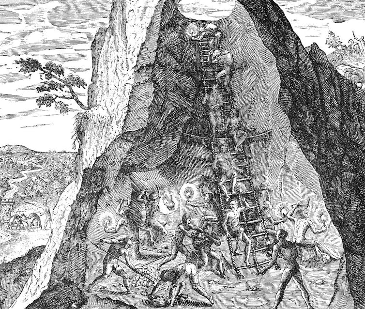 A black and white engraving shows people working in a mine with a ladder leading to the entrance.