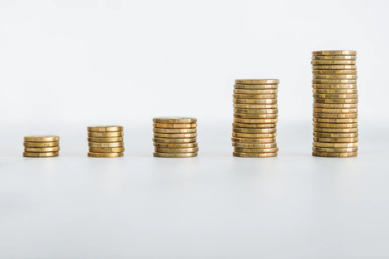 piles of coins of increasing height