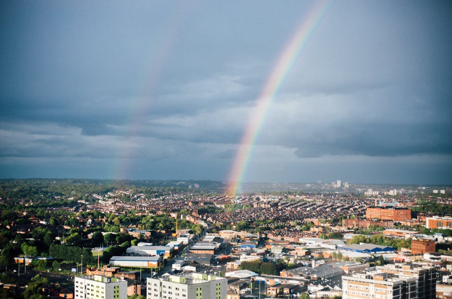 Aerial shot of Leeds with rainbow in the sky.