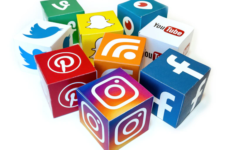 A mix of icons printed on cubes representing social media sites