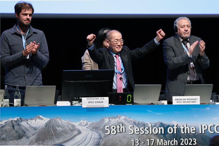 People celebrating at the end of a session by the IPCC