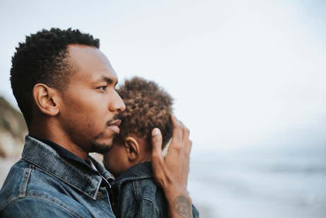 Man holding his son