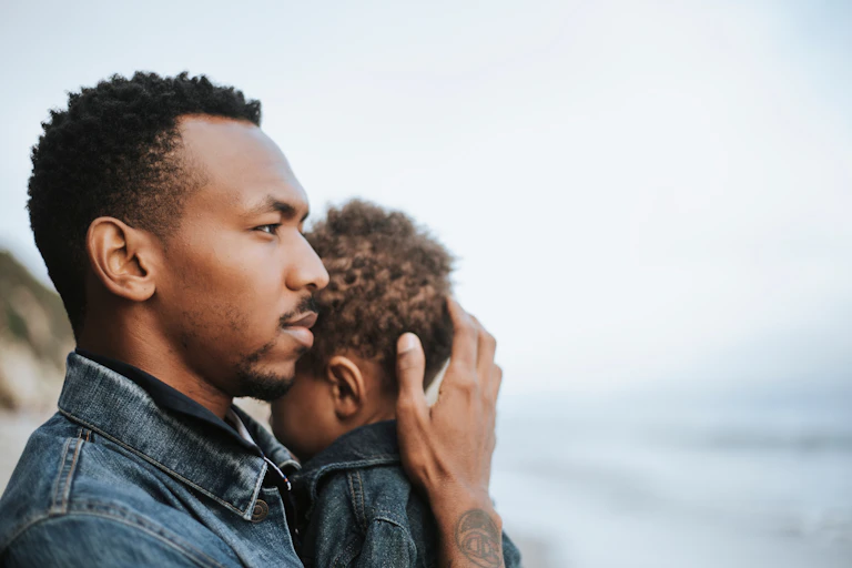 Man holding his son