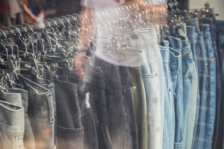 Rack of jeans in a shop window