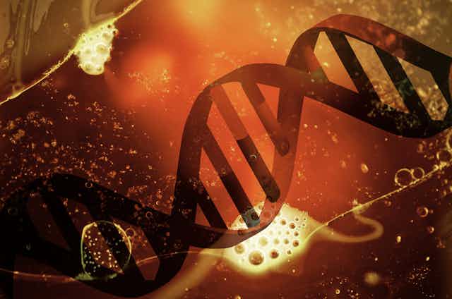 dna double helix strand on abstract glowing background