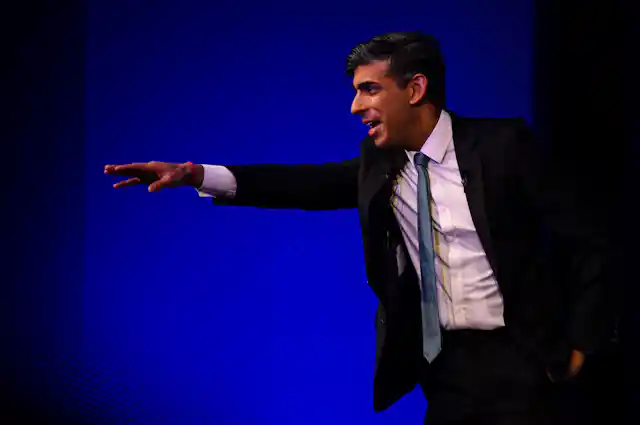 Rishi Sunak reaching out his arm