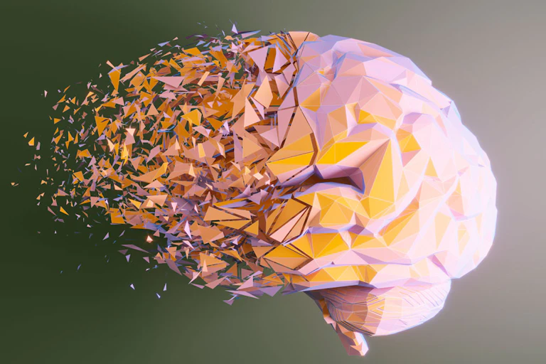 Ilustración de un cerebro que se desintegra.